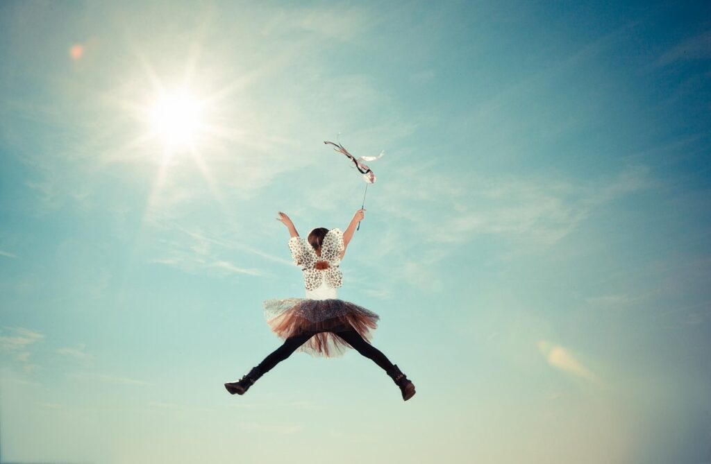 child, costume, fairy, fly, girl, heaven, nature, jump, sunlight, motion, outdoors, sky, sun, happy, jumping, fairy costume